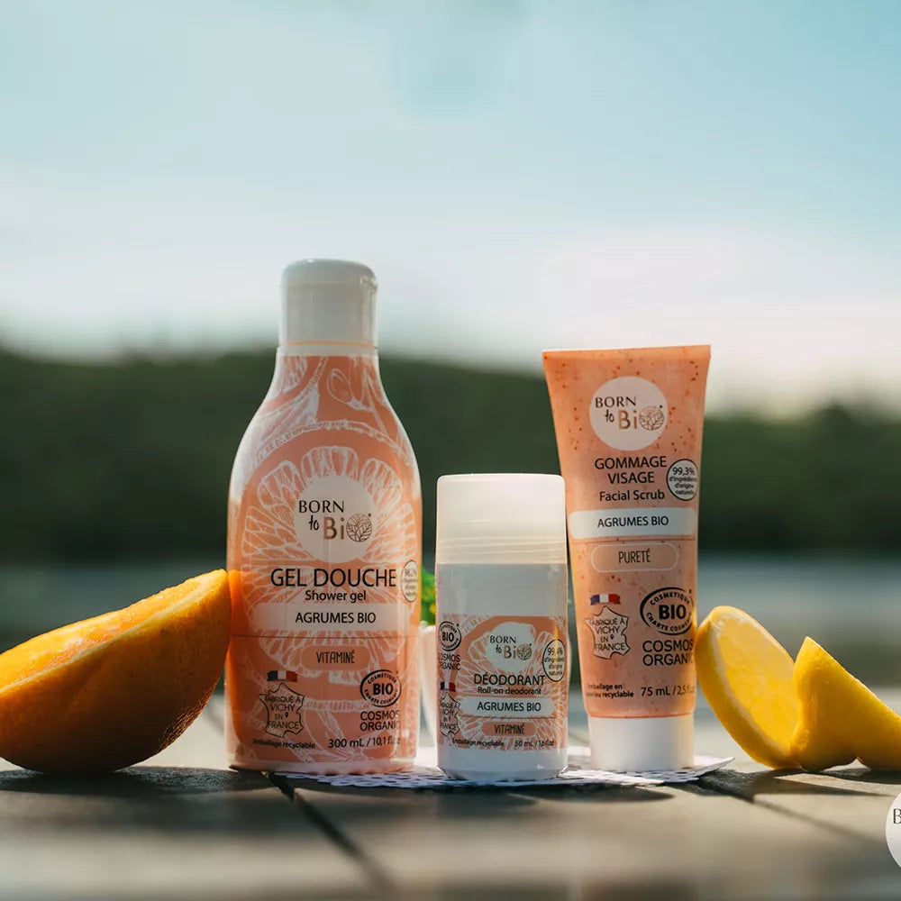 Citrus Shower Gel Certified Organic alongside other natural body care products and citrus slices.